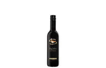 Eine Flasche Big John Cuvee Reserve Rotwein mit schwarzem Etikett und goldenen Akzenten.