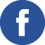 White Facebook f logo on a blue circular background.