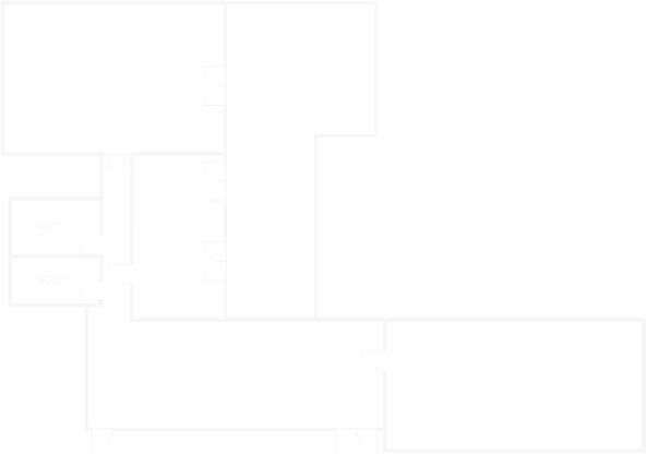 Schwarzer und weißer Grundriss mit beschrifteten Zimmern: Wohnzimmer, Küche, zwei Schlafzimmer, zwei Bäder und ein Flur.